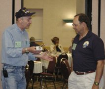 Steve presenting the trophy to Harry for the YAGR's archives